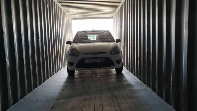 CAR IN CONTAINER